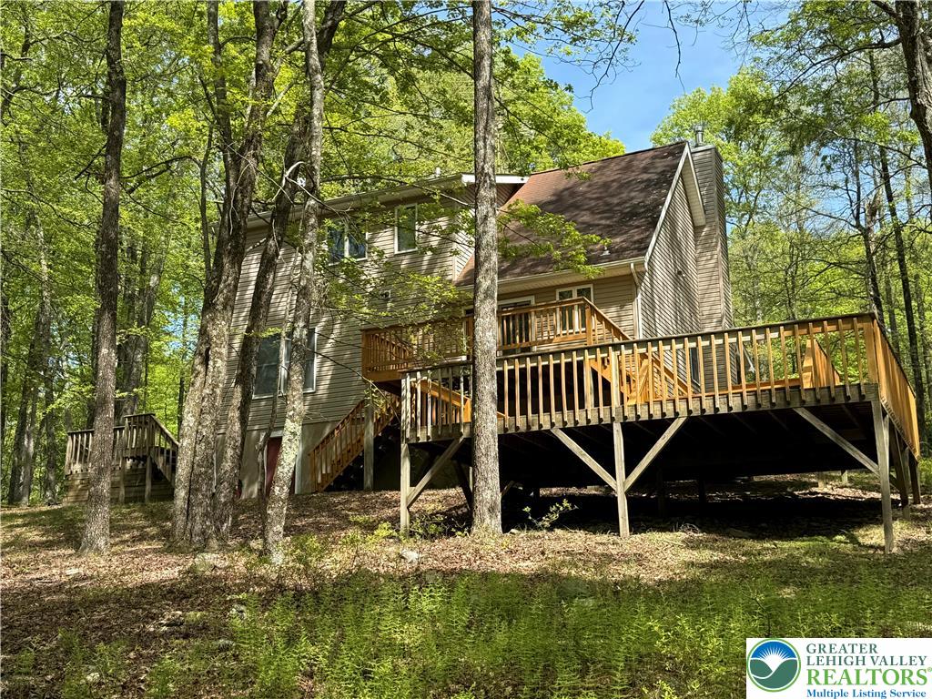 184 Doe Loop Bushkill, PA 18324 - Photo 3 of 18 a view of a house with a yard