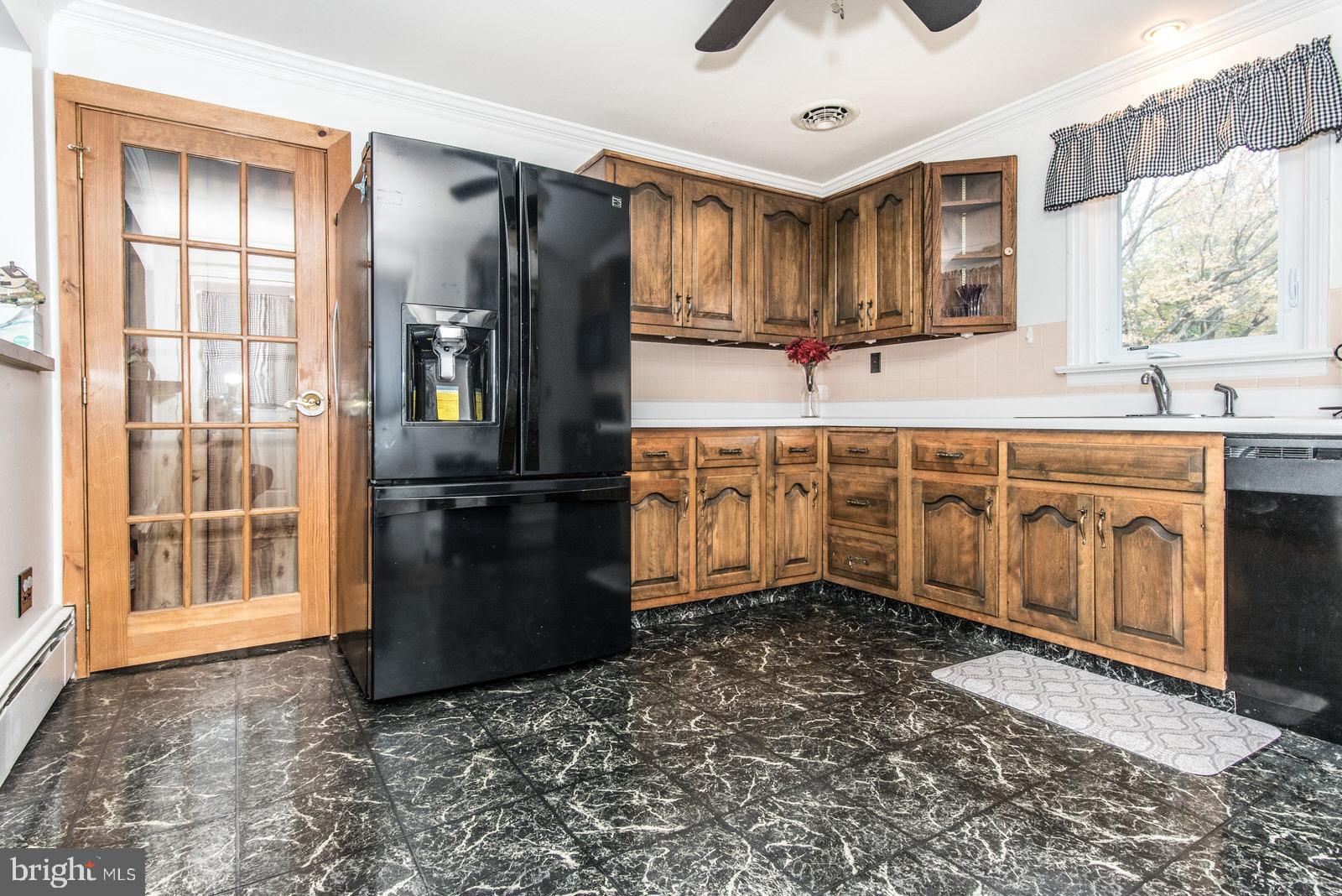 1145 County Line Road Huntingdon Valley, PA 19006 - Photo 23 of 53 Kitchen with French door to Finished Basement