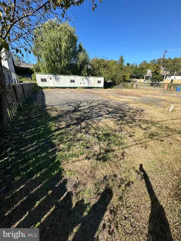 a view of an ocean beach and a mountain