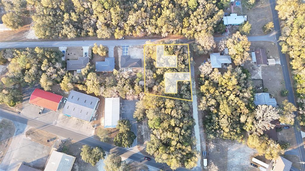 3298 East Pierce Street Inverness, FL 34453 - Photo 3 of 8 a view of building and yard