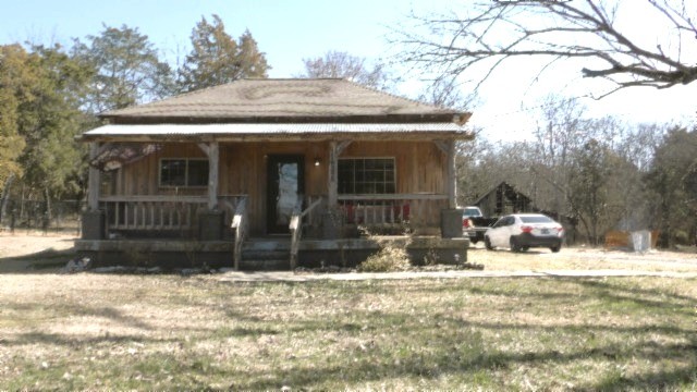 a view of a house with snow on the ground