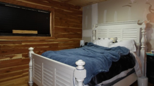 1586 Needmore Road Old Hickory, TN 37138 - Photo 4 of 45 a bedroom with a bed and flat screen tv