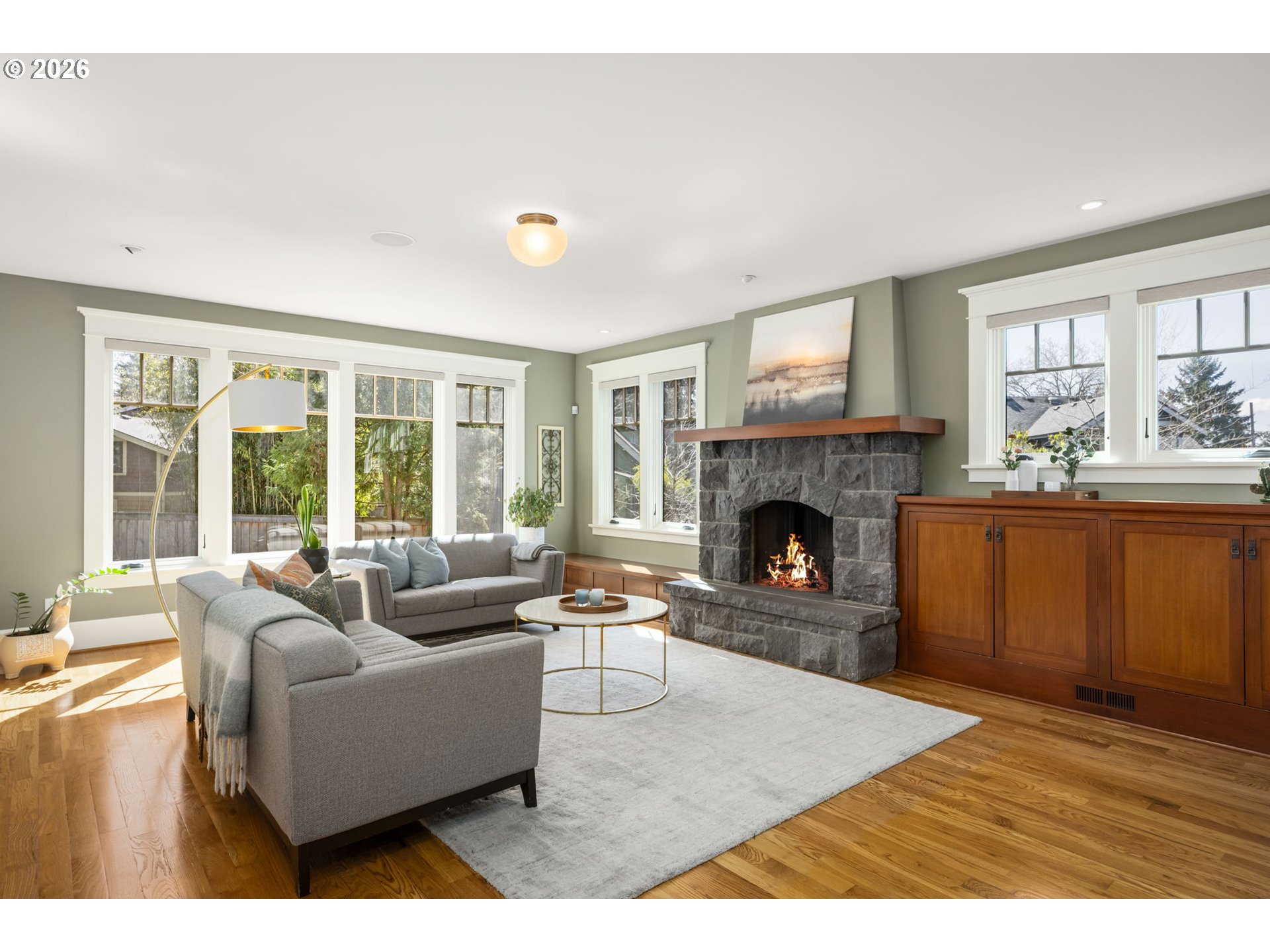 1030 Southeast 58th Place Portland, OR 97215 - Photo 16 of 48 a living room with furniture and a fireplace