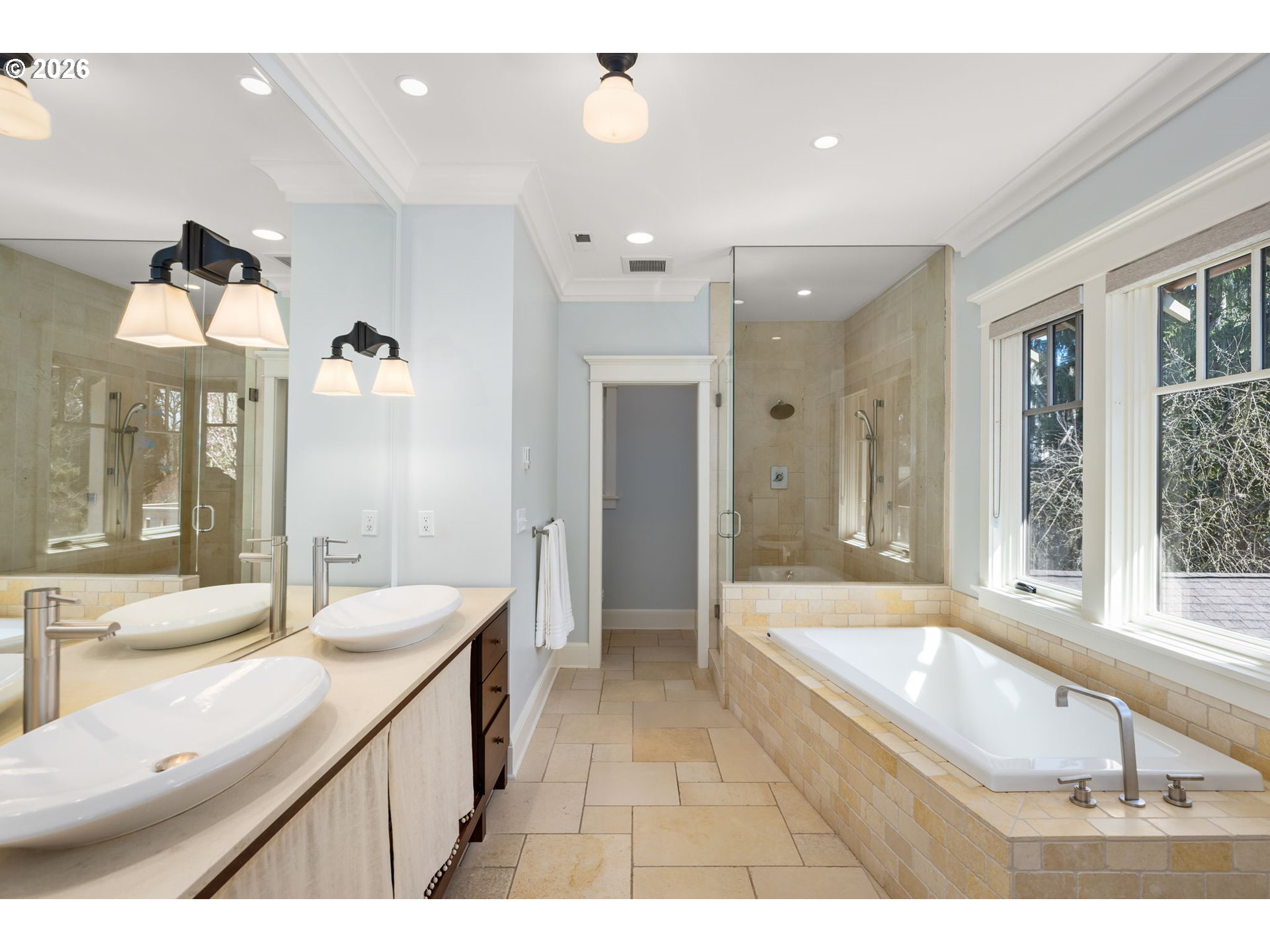 1030 Southeast 58th Place Portland, OR 97215 - Photo 23 of 48 a bathroom with a sink a large mirror and a bathtub
