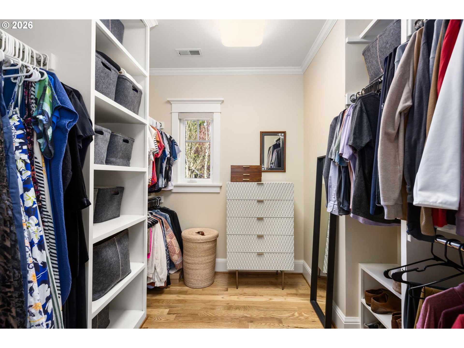 1030 Southeast 58th Place Portland, OR 97215 - Photo 26 of 48 a view of walk in closet with clothes and shoes