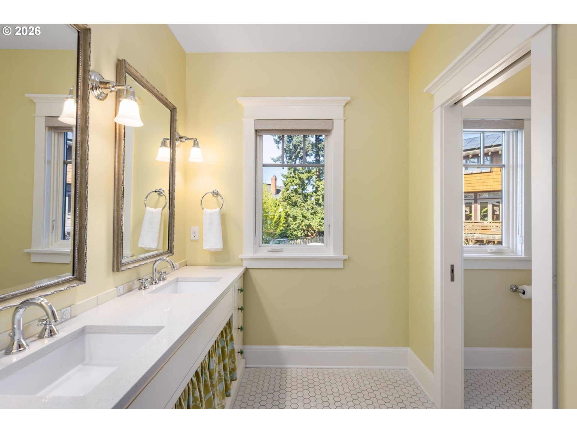 1030 Southeast 58th Place Portland, OR 97215 - Photo 29 of 48 a bathroom with a granite countertop sink a mirror and a shower
