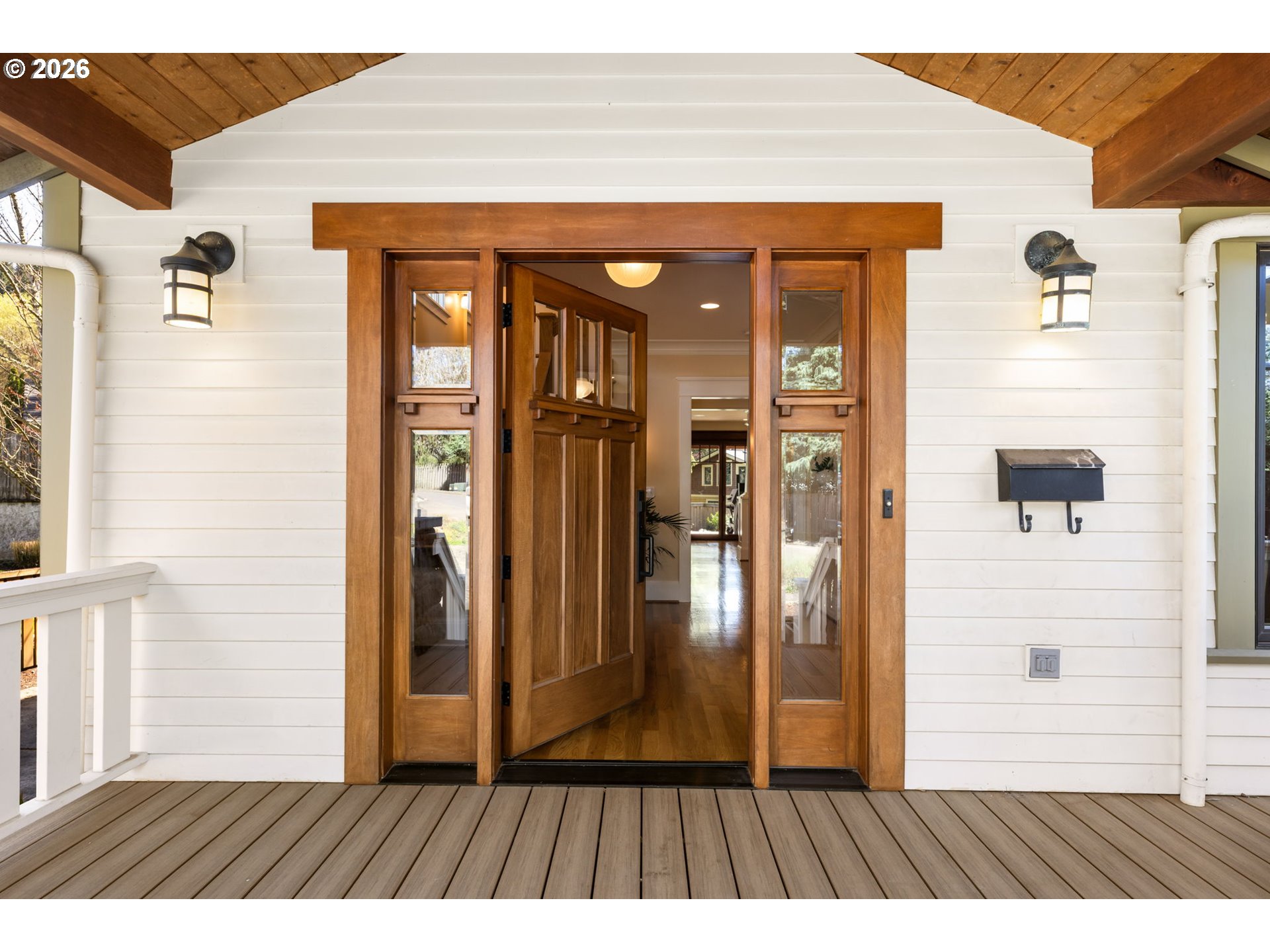 1030 Southeast 58th Place Portland, OR 97215 - Photo 3 of 48 a view of a wooden door