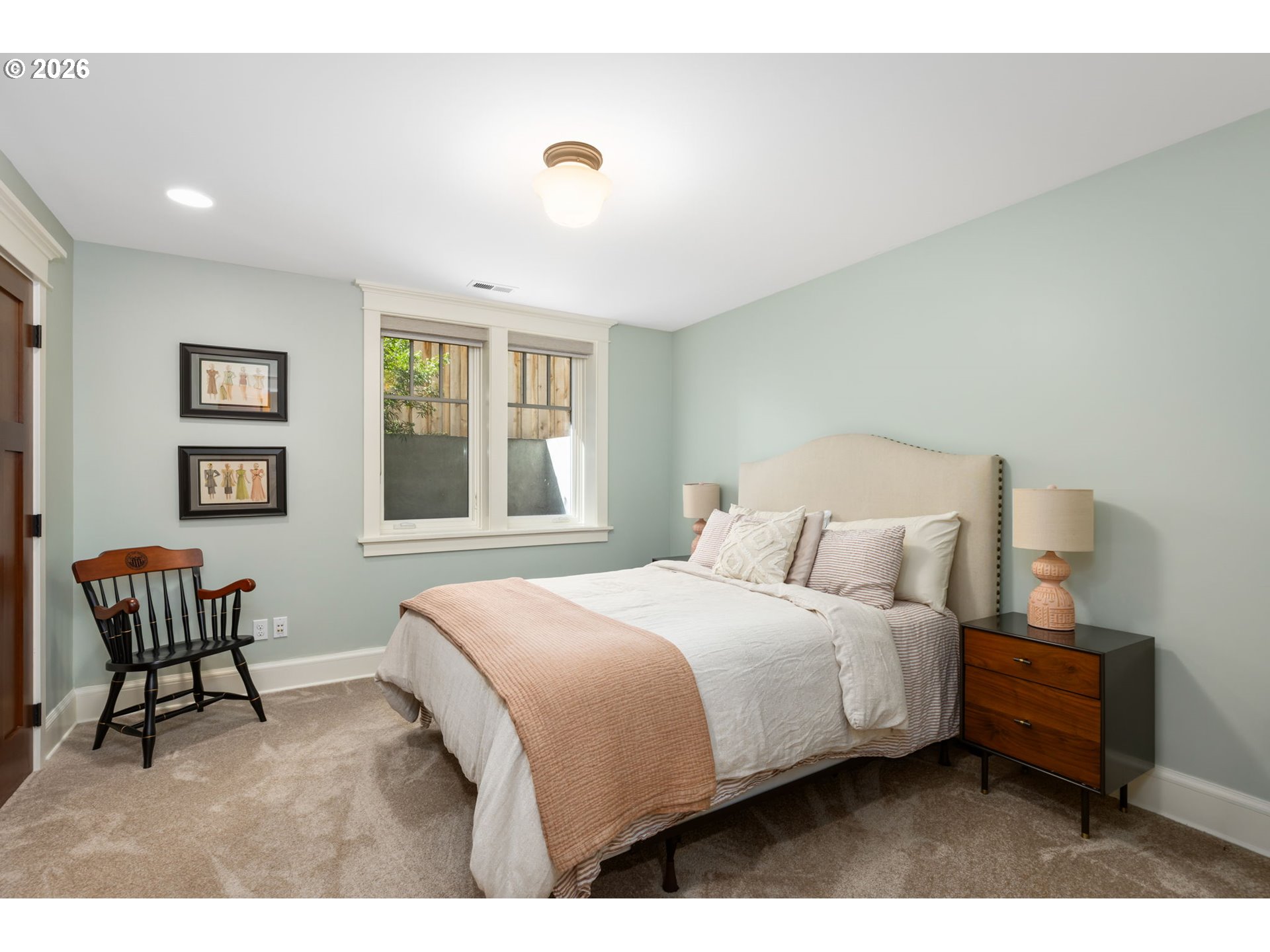 1030 Southeast 58th Place Portland, OR 97215 - Photo 34 of 48 a bedroom with a bed chairs and window