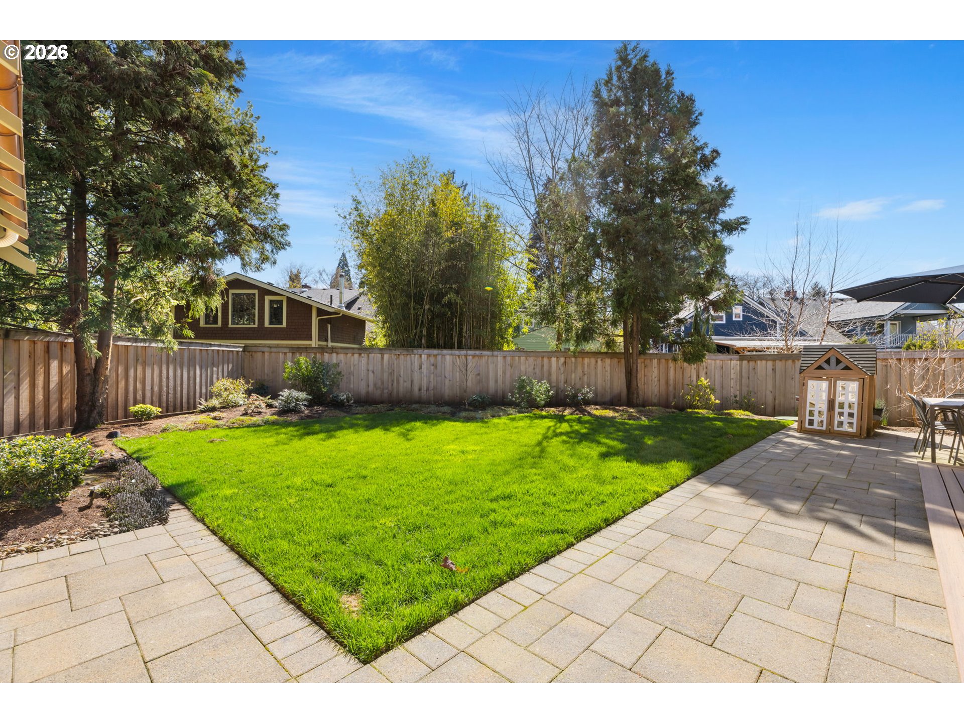 1030 Southeast 58th Place Portland, OR 97215 - Photo 40 of 48 a view of a backyard with a garden