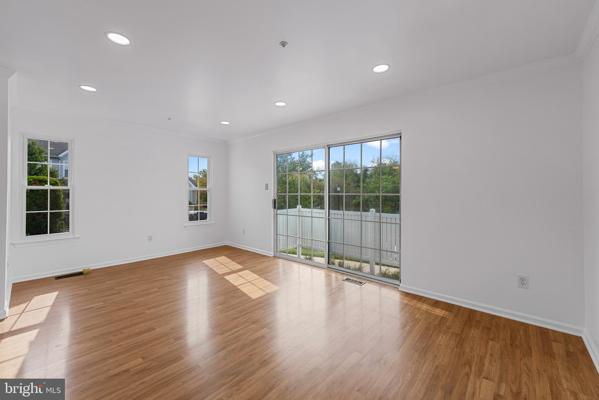 540 Eagle Court Jamison, PA 18929 - Photo 13 of 32 a view of an empty room with wooden floor and a window