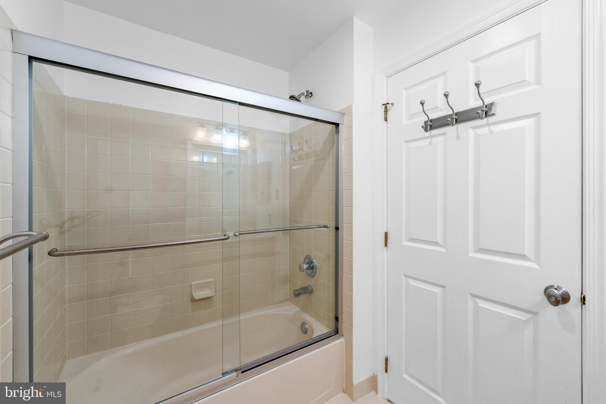 540 Eagle Court Jamison, PA 18929 - Photo 22 of 32 a bathroom with a glass shower door
