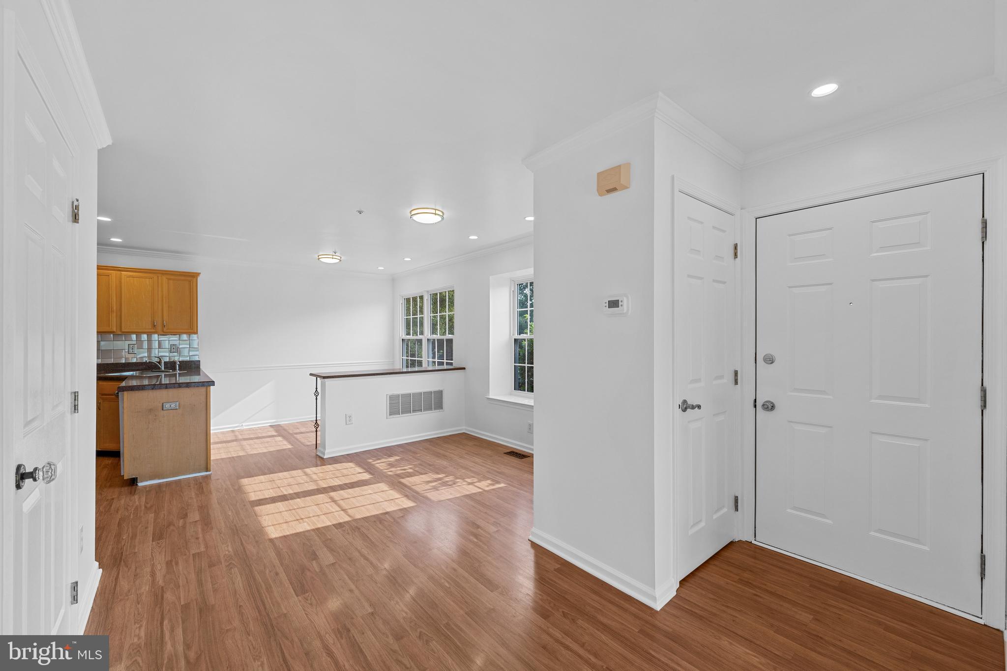 540 Eagle Court Jamison, PA 18929 - Photo 10 of 32 a view of a kitchen with wooden floor and a refrigerator