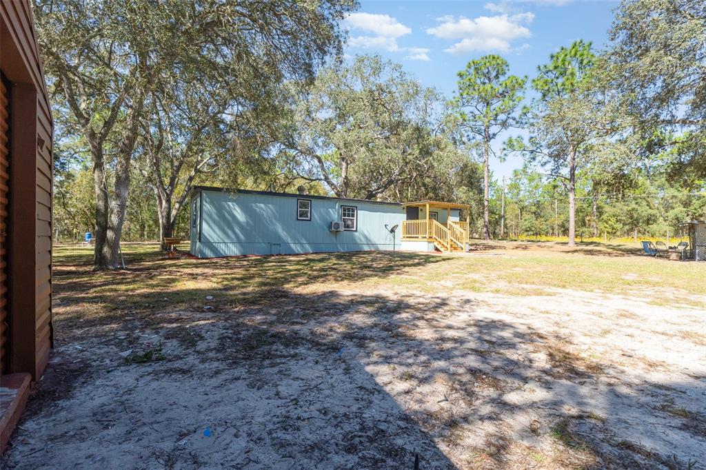 4664 Southwest 181st Court Dunnellon, FL 34432 - Photo 23 of 46 a view of a outdoor space with a house