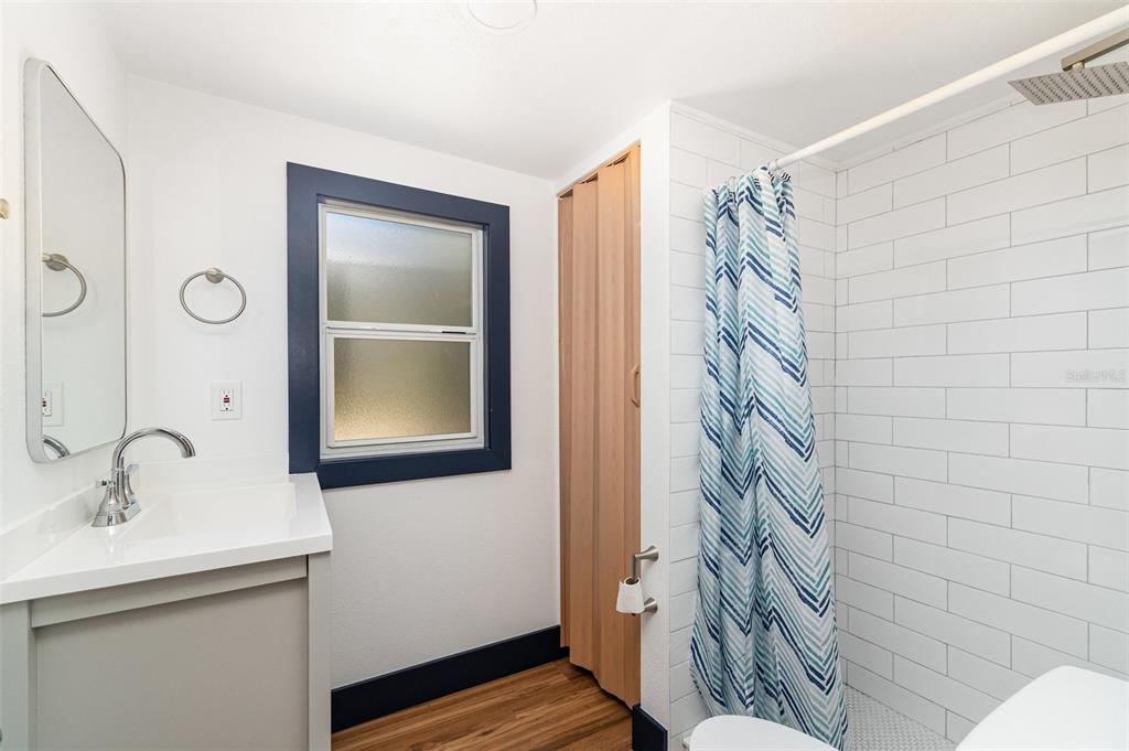 4664 Southwest 181st Court Dunnellon, FL 34432 - Photo 28 of 46 a bathroom with a sink and a mirror