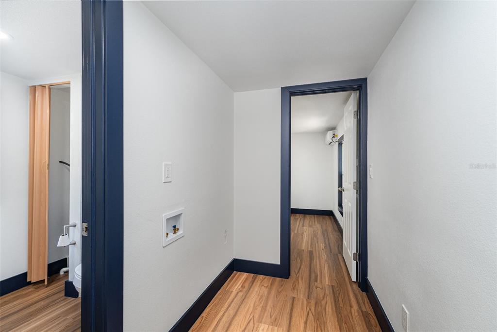 4664 Southwest 181st Court Dunnellon, FL 34432 - Photo 32 of 46 a view of a hallway with wooden floor