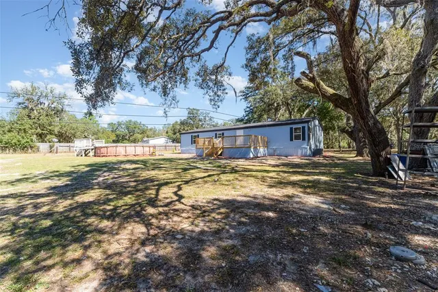 a house view with a outdoor space