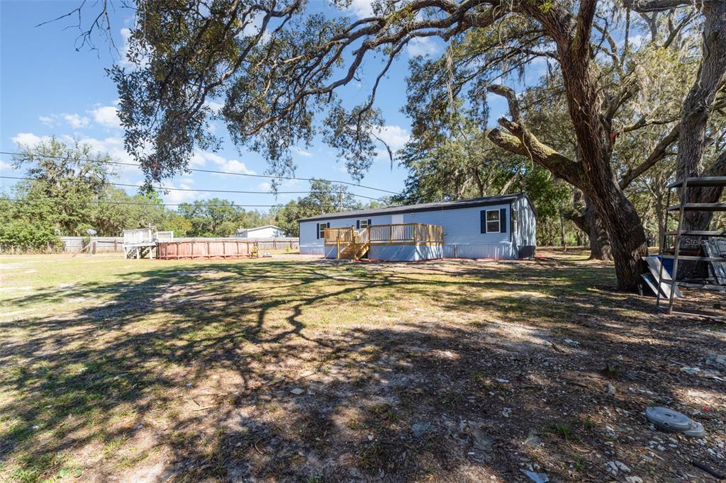 4664 Southwest 181st Court Dunnellon, FL 34432 - Photo 34 of 46 a house view with a outdoor space