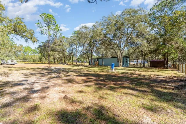 a view of road with trees