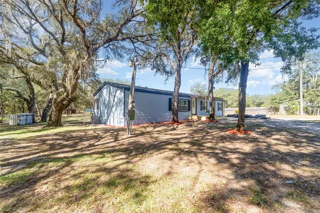 a view of road with trees