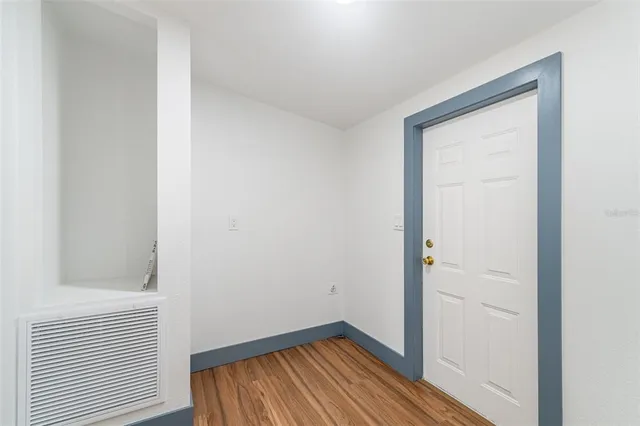 a view of a room that has a window in it