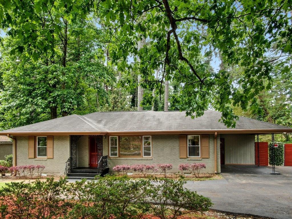 2540 Ben Hill Road East Point, GA 30344 - Photo 1 of 1 a front view of a house with garden