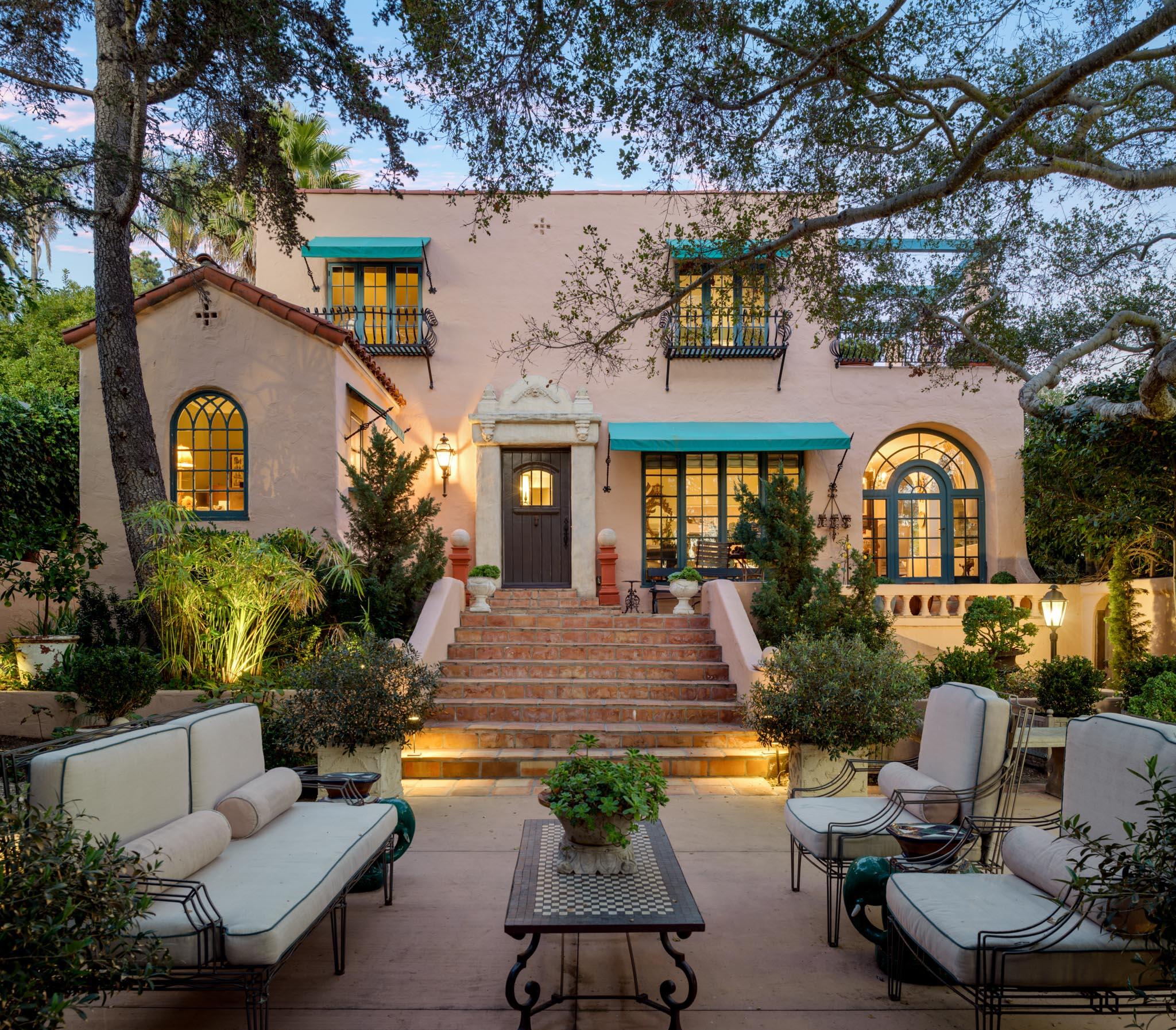 1318 Alta Vista Road Santa Barbara, CA 93103 - Photo 1 of 44 a front view of a house with patio furniture and a fire pit