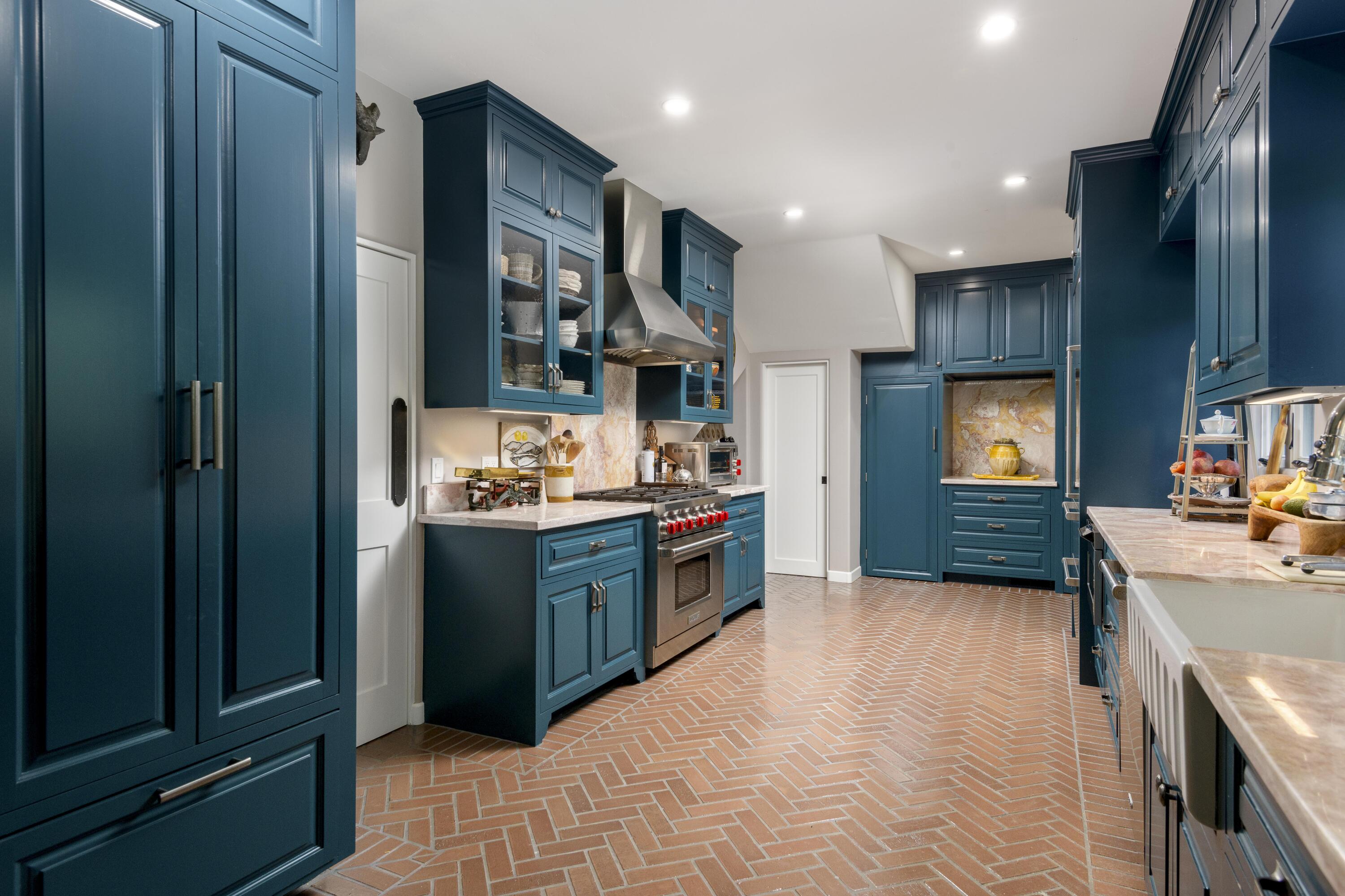 1318 Alta Vista Road Santa Barbara, CA 93103 - Photo 14 of 44 a kitchen with stainless steel appliances granite countertop a refrigerator a sink dishwasher and wooden cabinets with wooden floor