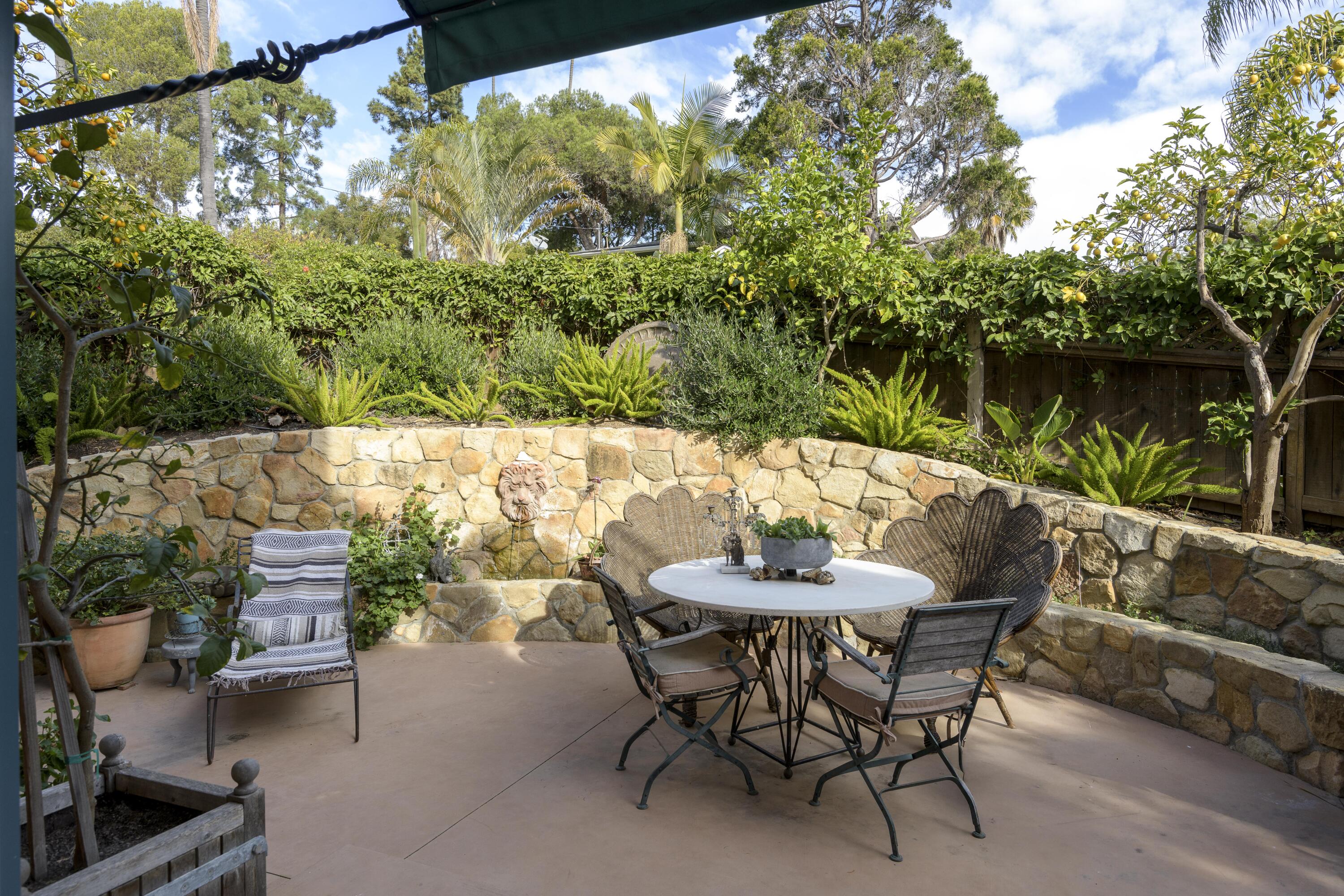 1318 Alta Vista Road Santa Barbara, CA 93103 - Photo 16 of 44 a view of table and chairs in patio