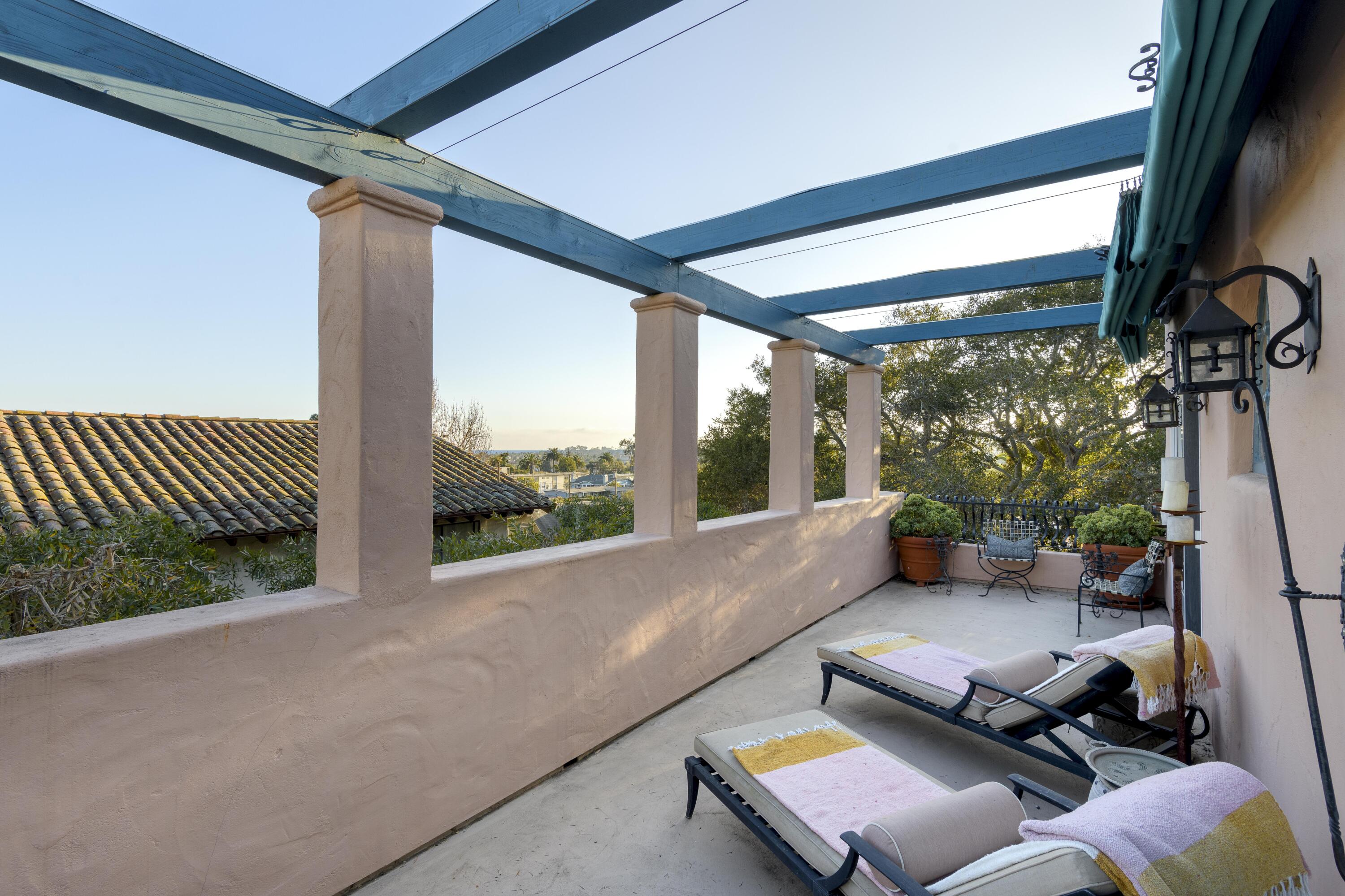 1318 Alta Vista Road Santa Barbara, CA 93103 - Photo 25 of 44 a balcony with furniture and a potted plant