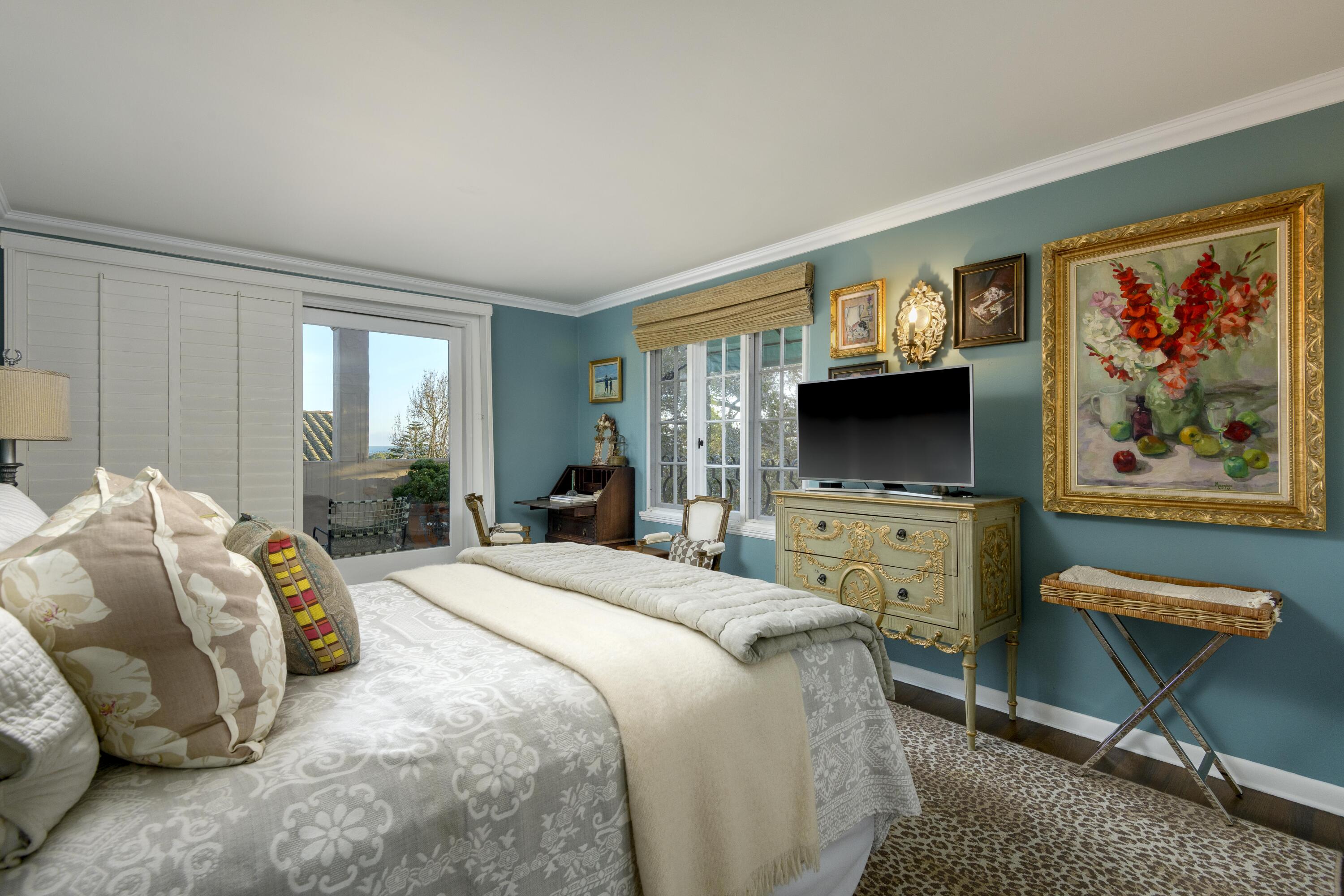 1318 Alta Vista Road Santa Barbara, CA 93103 - Photo 26 of 44 a bedroom with a bed a dresser and flat screen tv