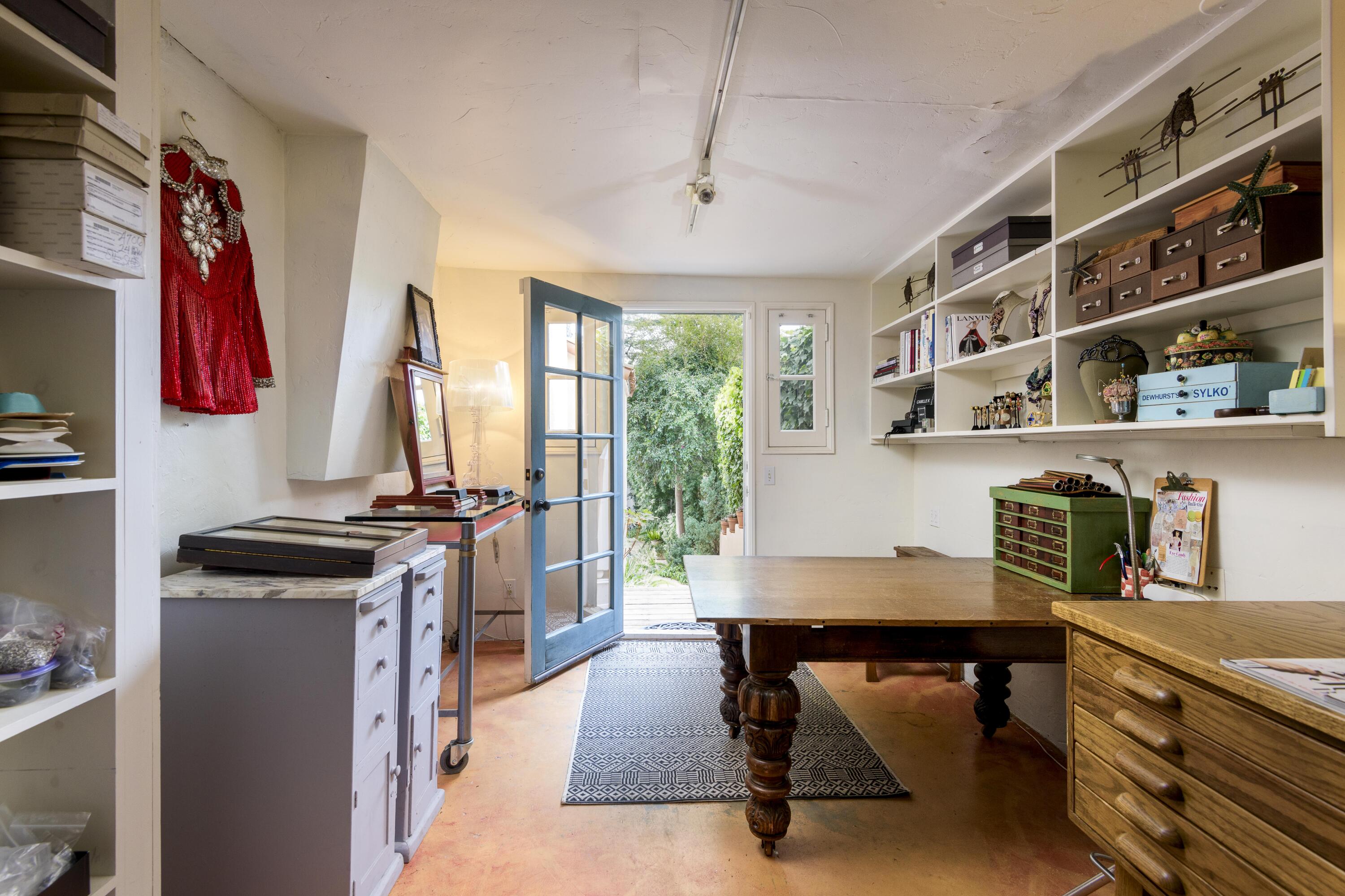 1318 Alta Vista Road Santa Barbara, CA 93103 - Photo 31 of 44 a view of a workspace with furniture and a window