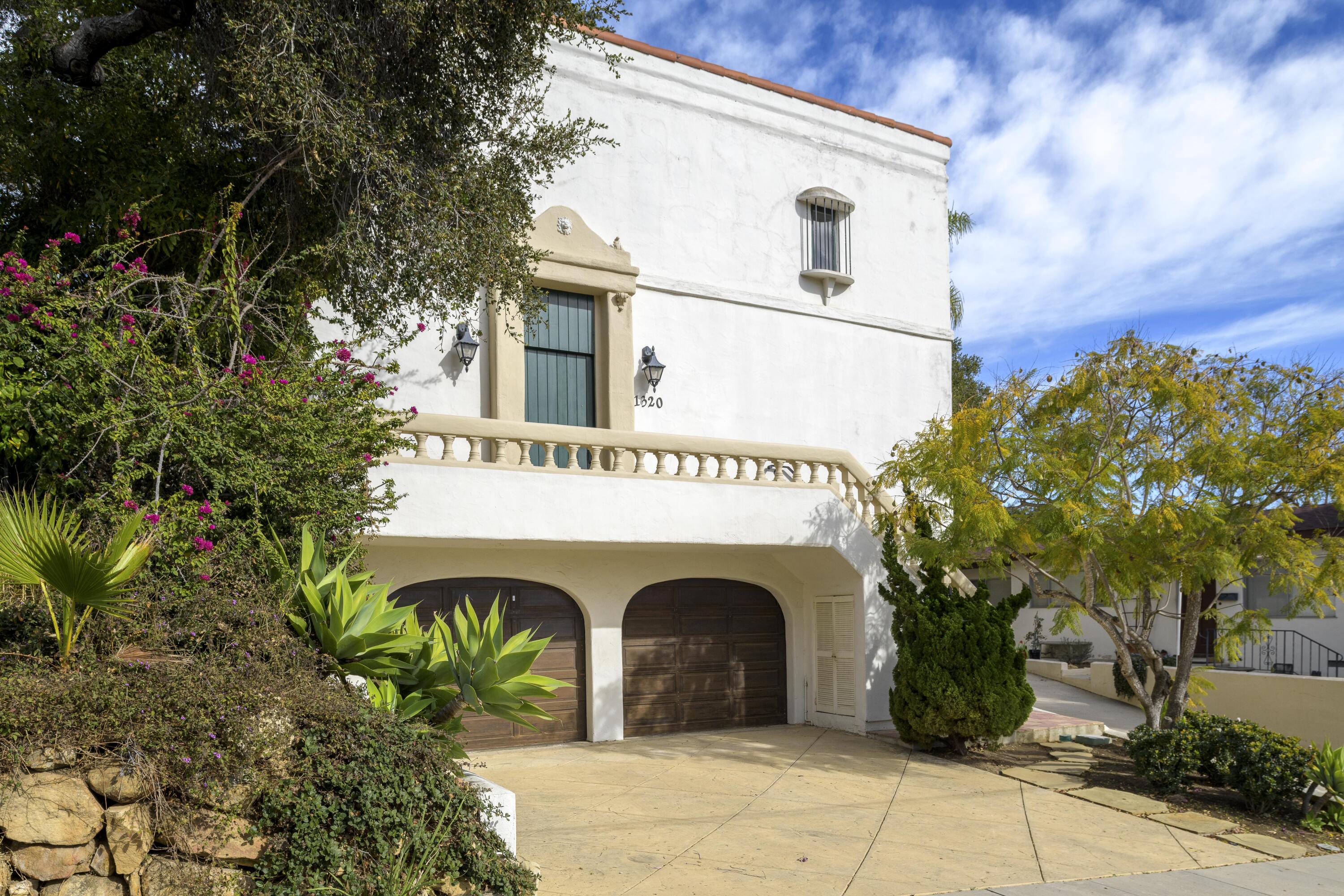 1318 Alta Vista Road Santa Barbara, CA 93103 - Photo 39 of 44 a view of a white house with a sink and large windows