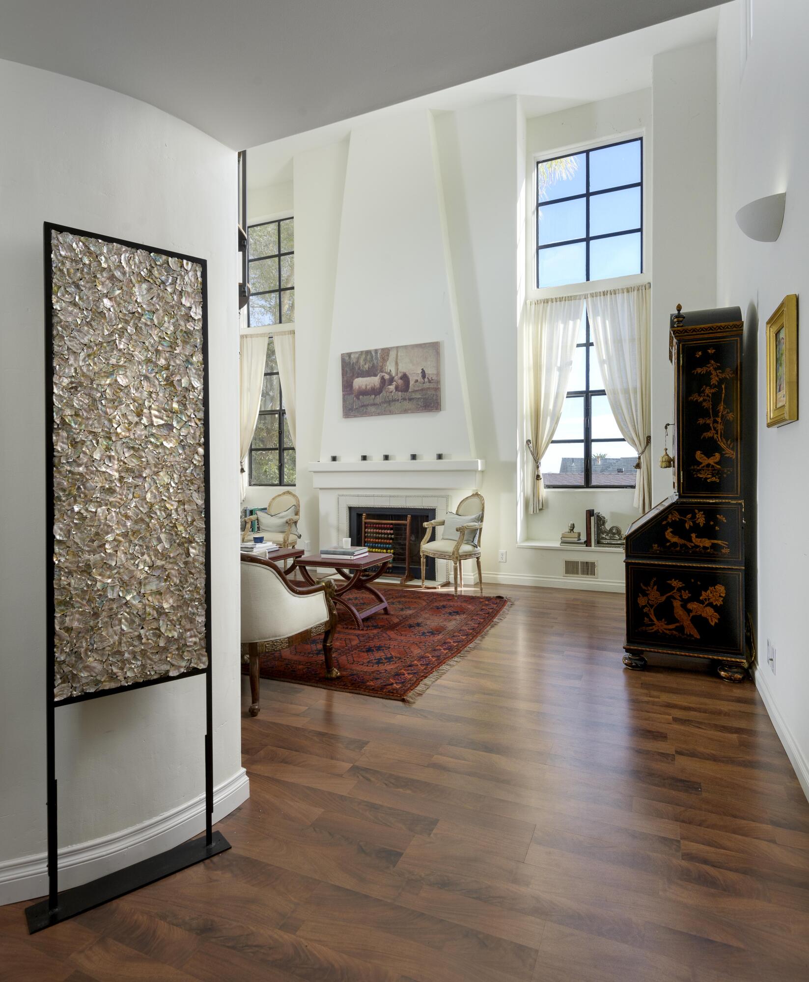 1318 Alta Vista Road Santa Barbara, CA 93103 - Photo 40 of 44 a living room with furniture and a fireplace