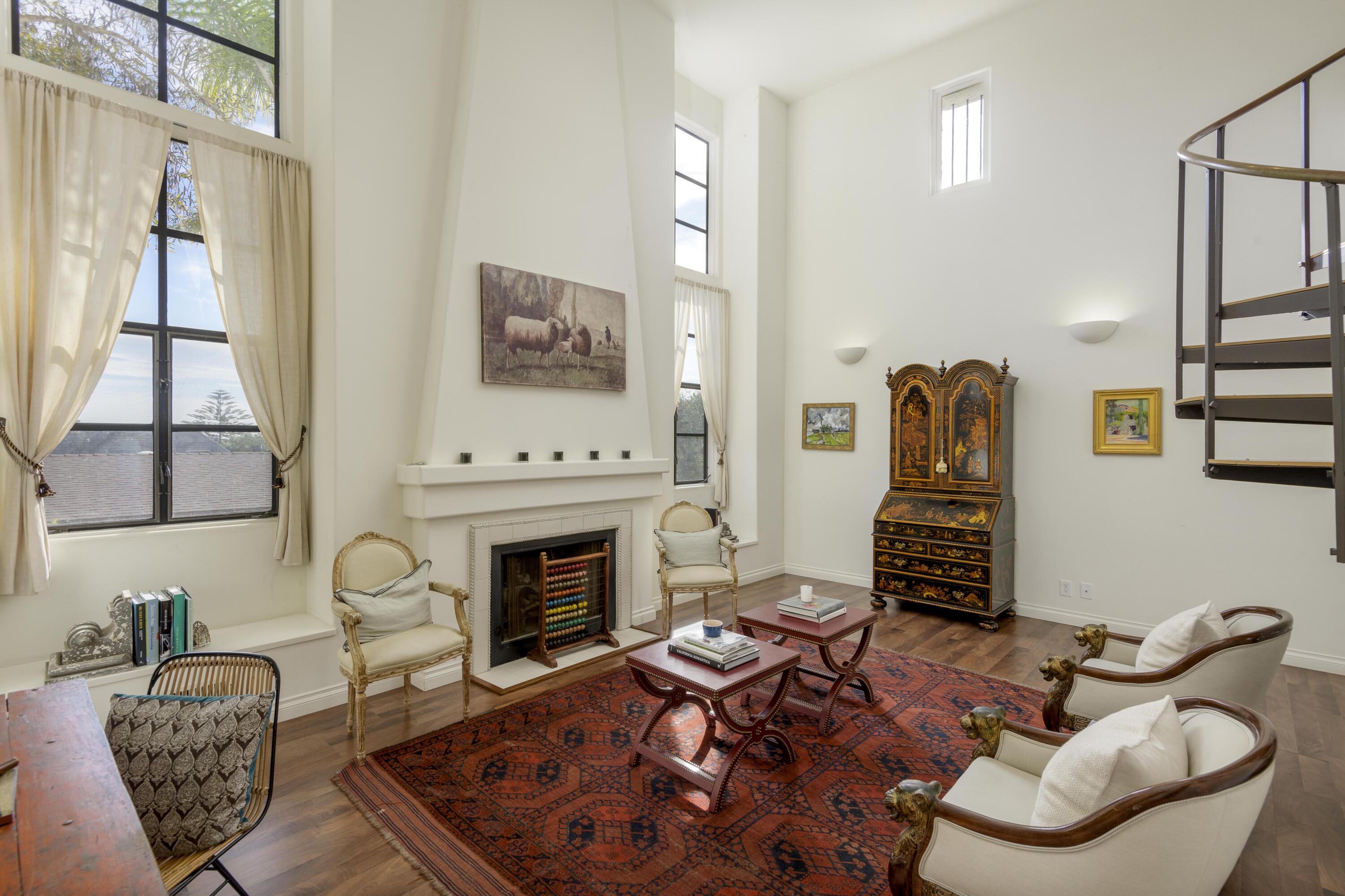 1318 Alta Vista Road Santa Barbara, CA 93103 - Photo 42 of 44 a living room with furniture a flat screen tv and a fireplace