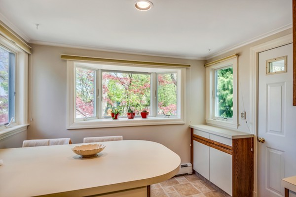 17 Tamarac Road Newton, MA 02464 - Photo 13 of 29 a bathroom with a sink a window and a bathtub