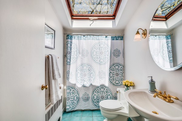 17 Tamarac Road Newton, MA 02464 - Photo 21 of 29 a bathroom with a sink toilet and shower