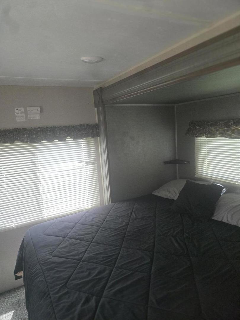 24-22 Woodhaven Sublette, IL 61367 - Photo 16 of 24 a bedroom with a bed and a window