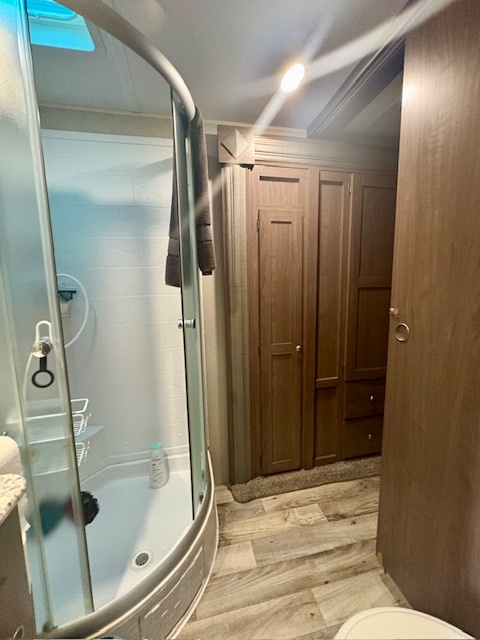 24-22 Woodhaven Sublette, IL 61367 - Photo 21 of 24 a bathroom with a shower and a sink