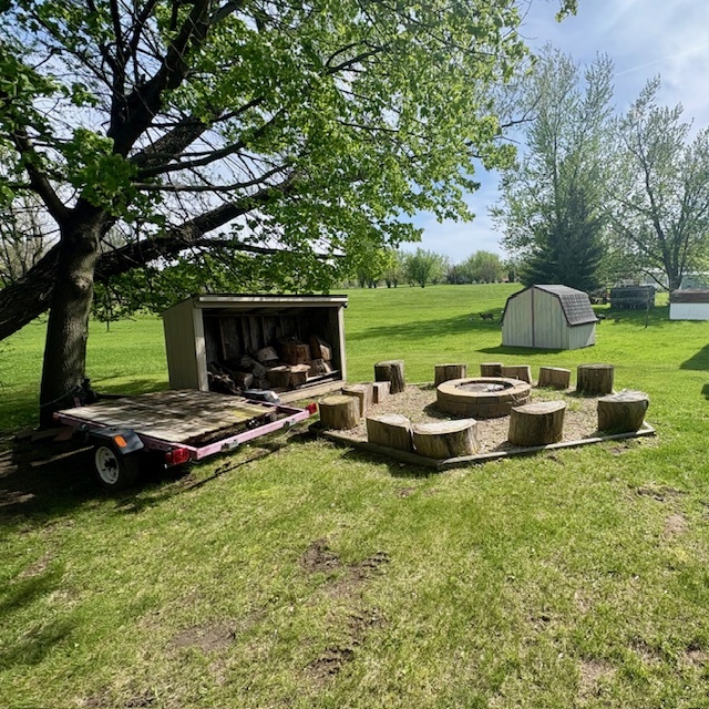 24-22 Woodhaven Sublette, IL 61367 - Photo 5 of 24 a view of a swimming pool and lounge chairs in back yard
