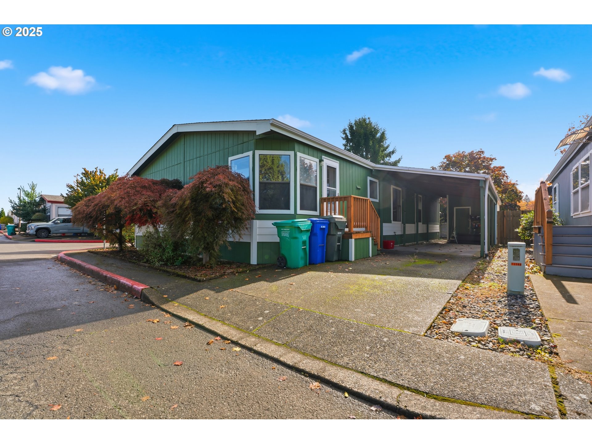 1949 Southeast Palmquist Road, Unit 32 Gresham, OR 97080 - Photo 1 of 31 a view of a house with entertaining space