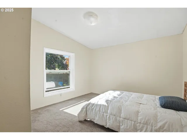 a view of a big room with closet and wooden floor
