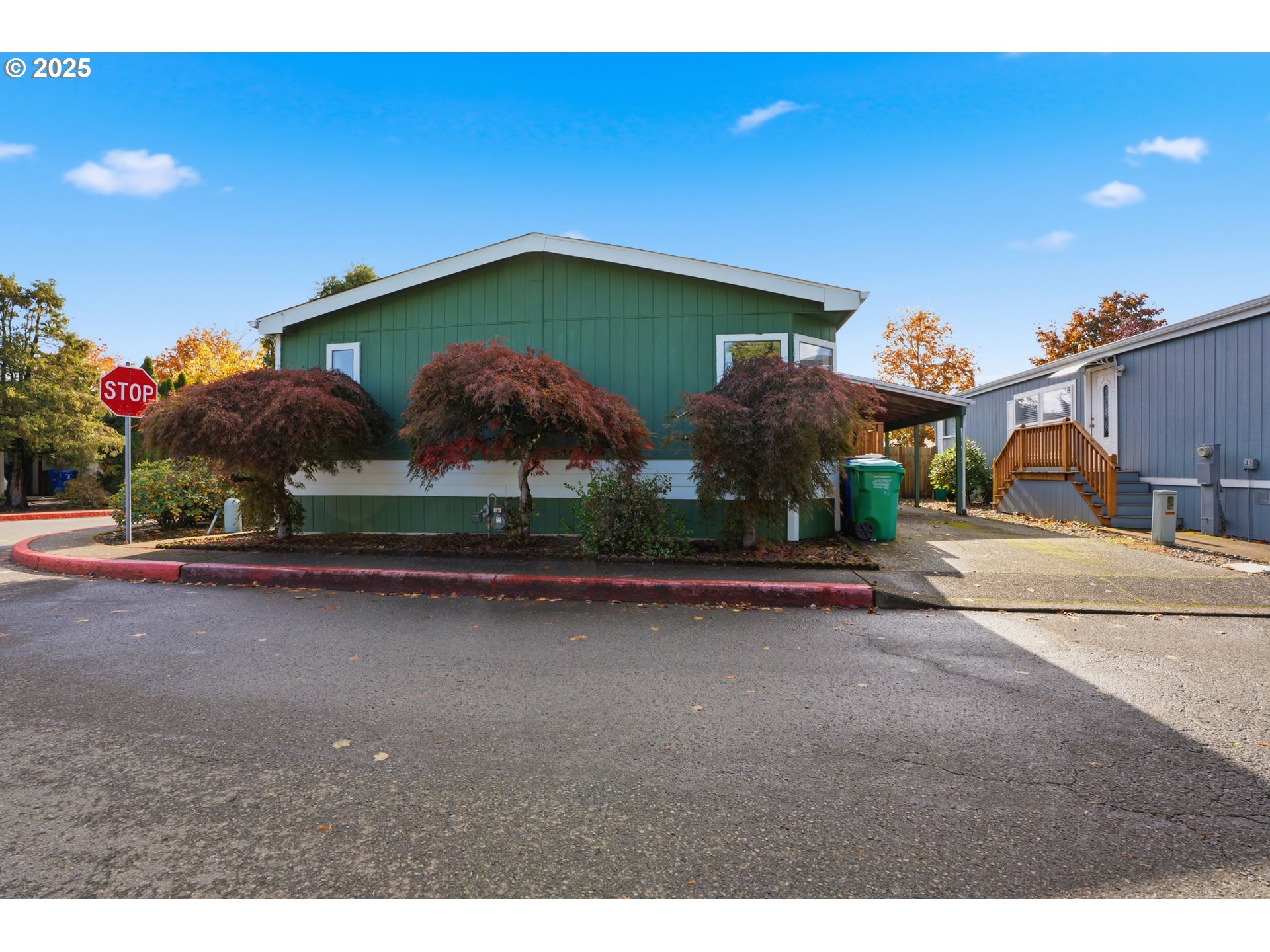 1949 Southeast Palmquist Road, Unit 32 Gresham, OR 97080 - Photo 2 of 31 a view of a street with houses