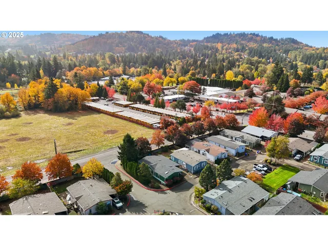 an aerial view of a house with a garden