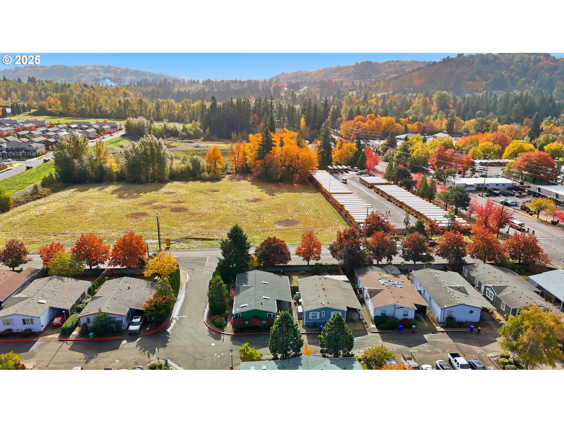 1949 Southeast Palmquist Road, Unit 32 Gresham, OR 97080 - Photo 30 of 31 an aerial view of a house with a garden