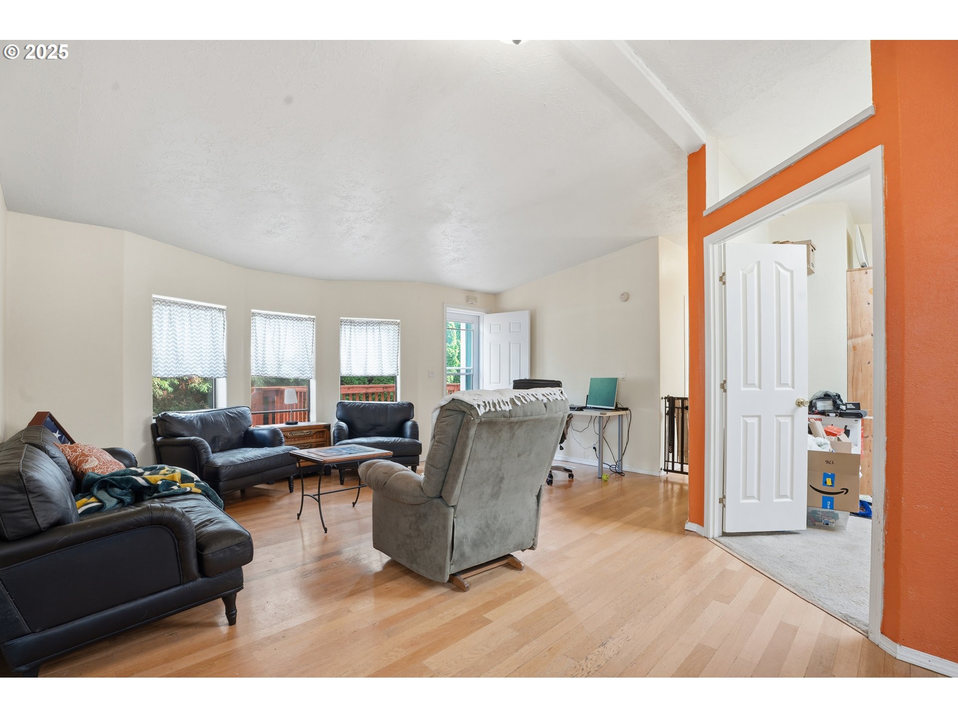 1949 Southeast Palmquist Road, Unit 32 Gresham, OR 97080 - Photo 5 of 31 a living room with furniture and a window