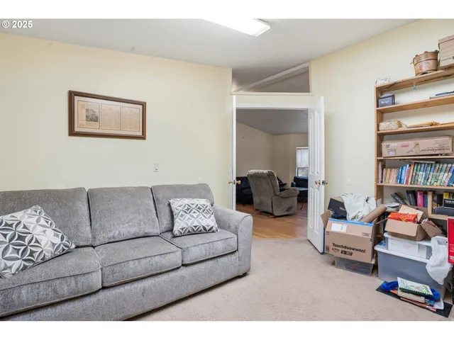 a living room with furniture and a couch