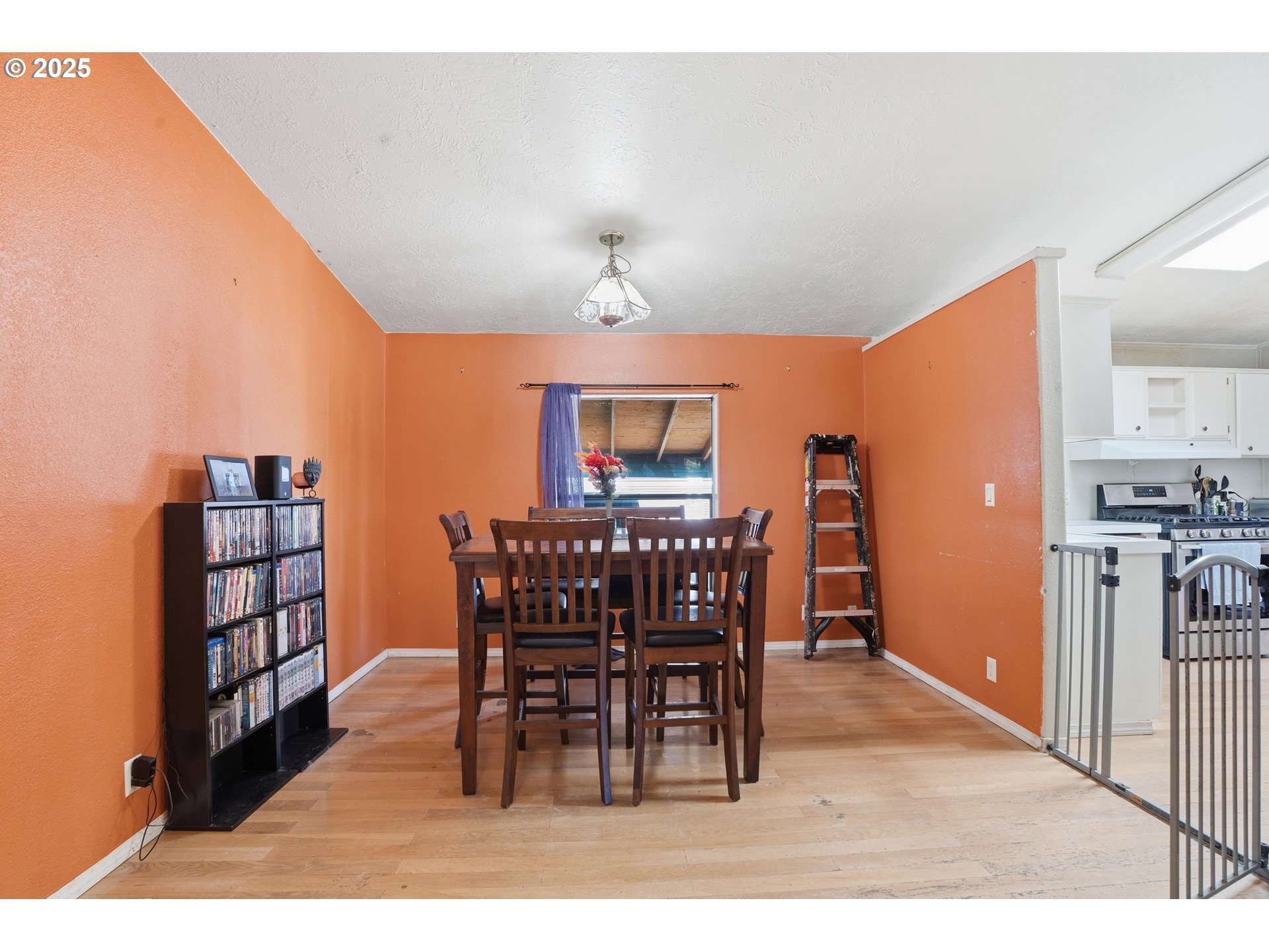 1949 Southeast Palmquist Road, Unit 32 Gresham, OR 97080 - Photo 7 of 31 a view of a dining room with furniture