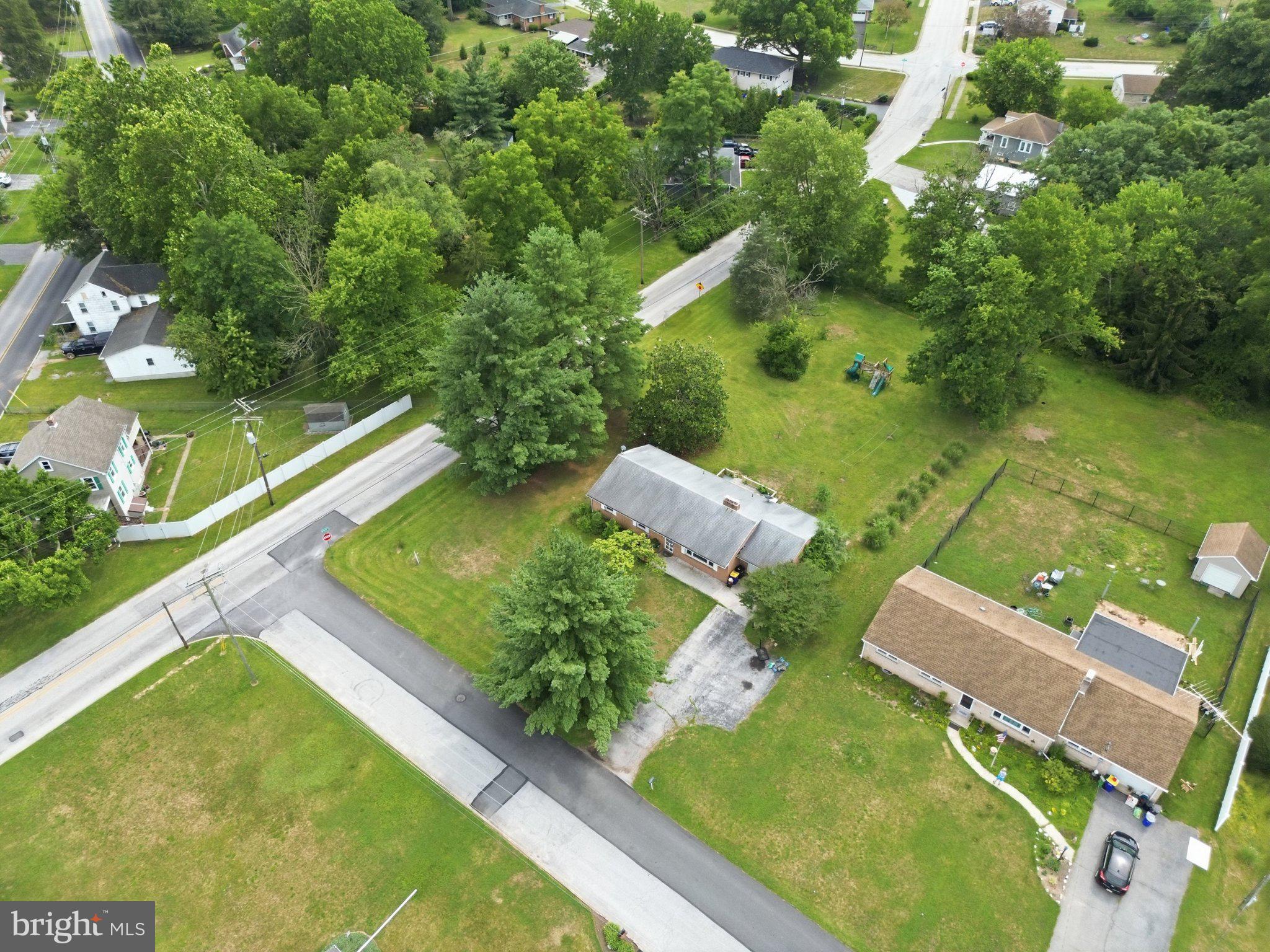 2400 Derry Road York, PA 17408 - Photo 50 of 56 Charming neighborhood with lush greenery.
