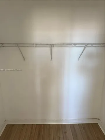 a view of a room with racks on the wall