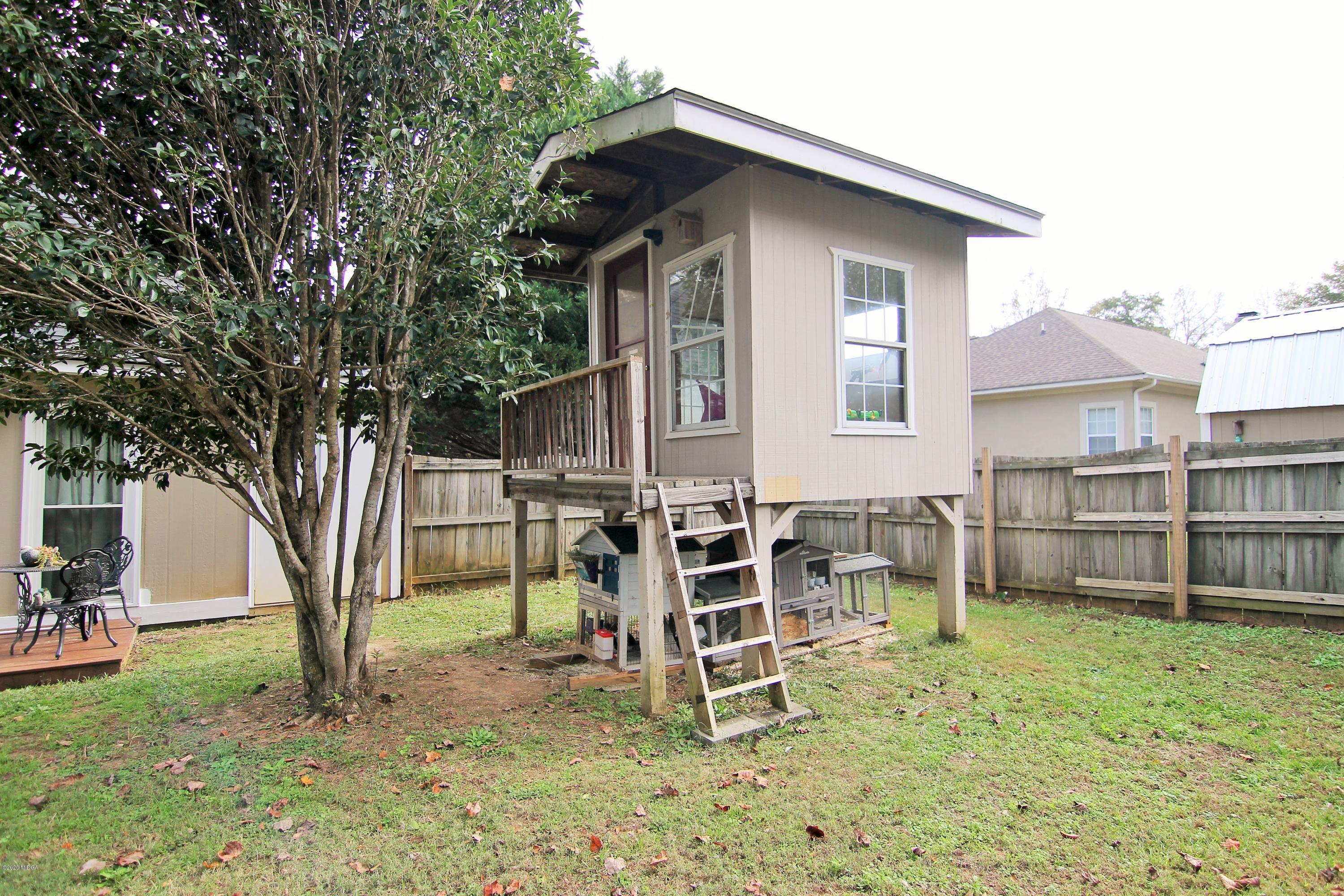 205 Cedar Ridge Drive Perry, GA 31069 - Photo 33 of 39 a view of a house with backyard